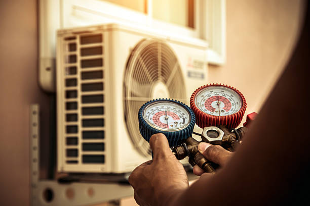 Professional Hvac technician working in Cortland, NY